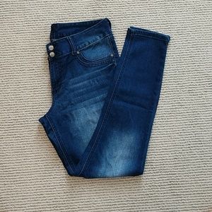 Dark wash mid rise blue jeans